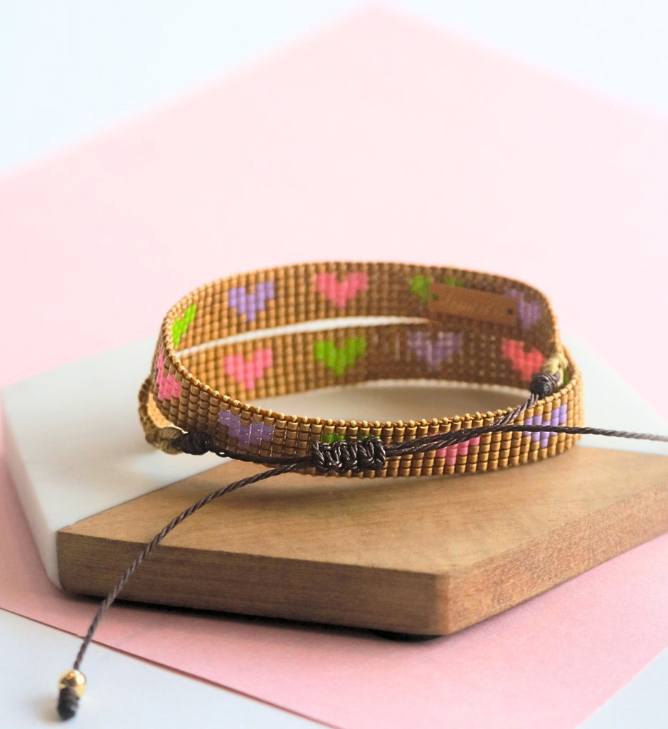 Pulsera doble vuelta corazones