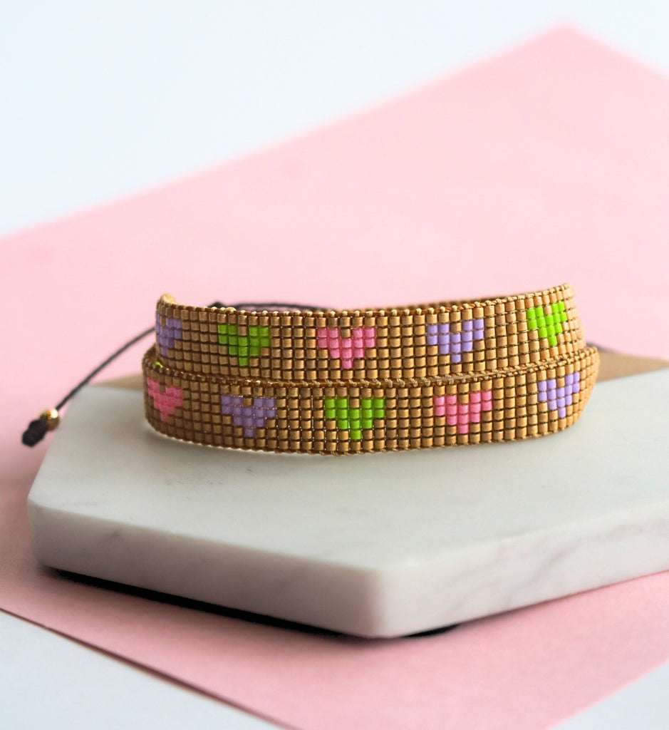 Pulsera doble vuelta corazones